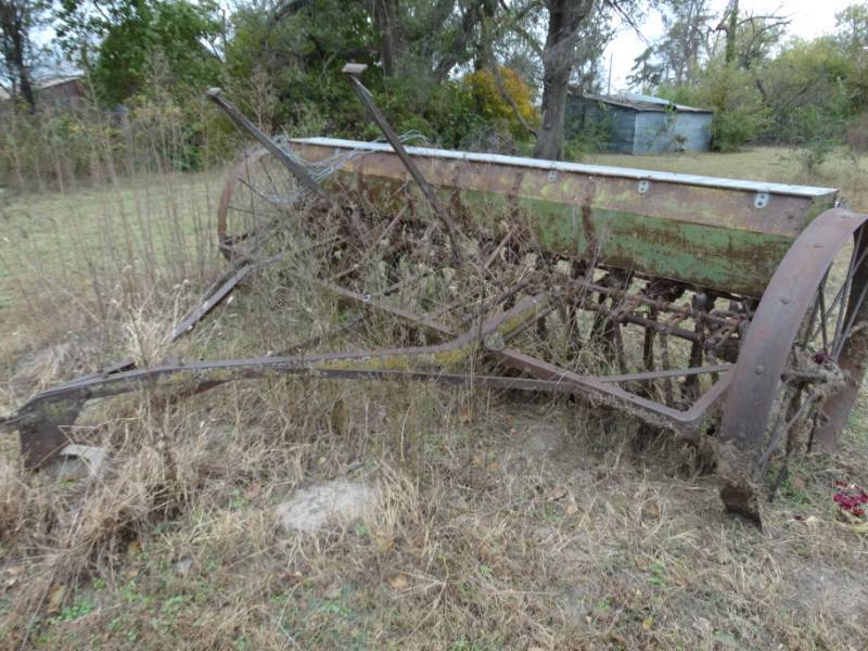 lot 2991 image: Old metal wheel farm implement- Pull behind seederplanter