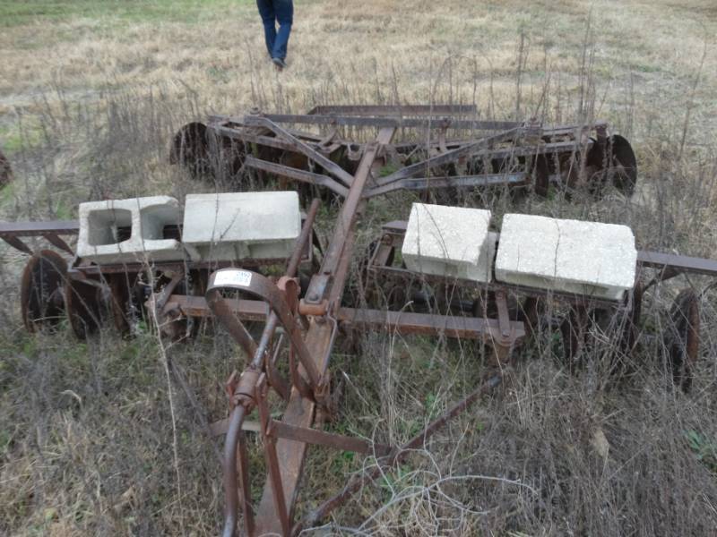 lot 2992 image: Old metal farm implement- Pull behind disk
