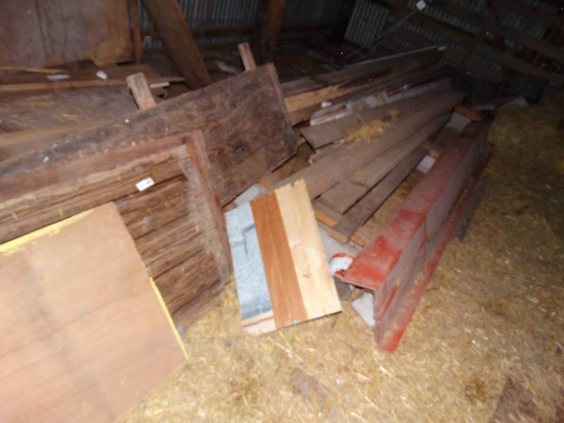 lot 7937 image: Large lot of various lumber- inside building