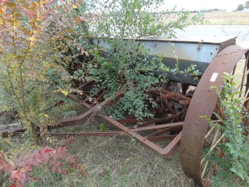 lot 7948 image: Old metal wheel farm implement- Pull behind seederplanter