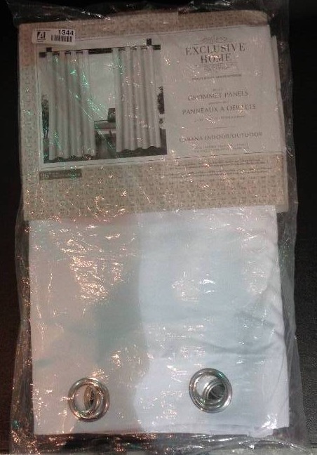 lot 1344 image: IndoorOutdoor Solid Cabana Grommet Top Window Curtain Panel Pair 96 - Exclusive Home