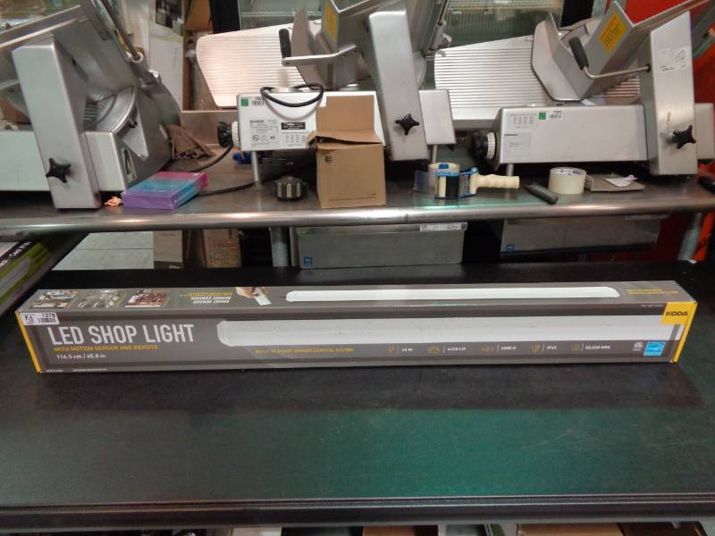 lot 1378 image: LED Shop Light With Motion Detector And Remote