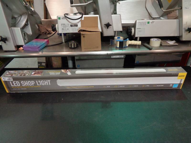 lot 1379 image: LED Shop Light With Motion Detector And Remote