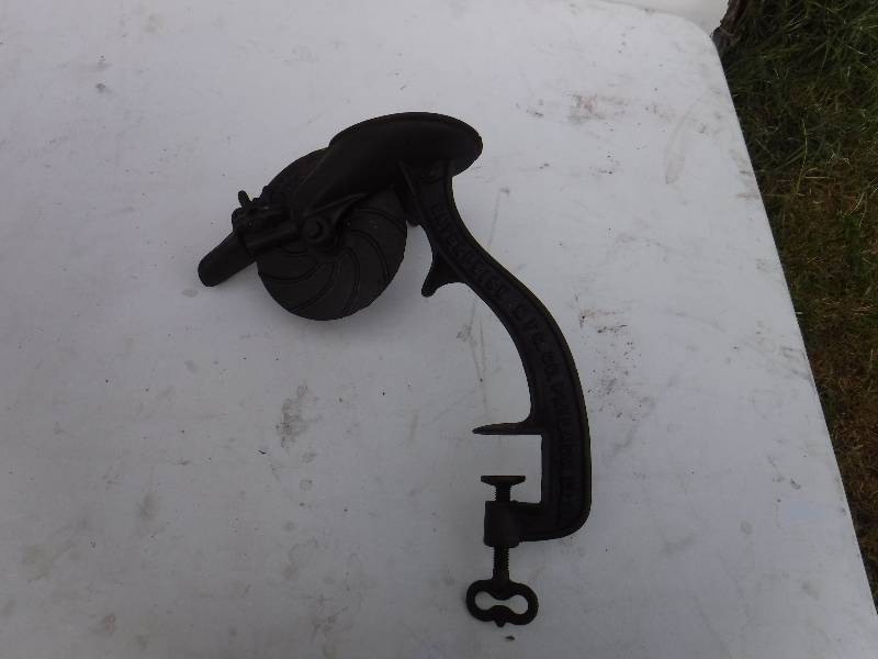 lot 6759 image: Vintage cast iron cherry pitter