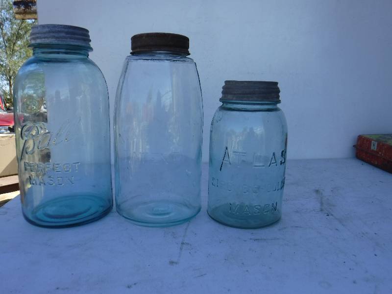 lot 6814 image: Vintage glass jars- Blue and clear with zinc lids
