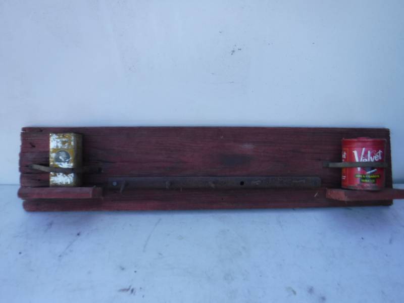 lot 6829 image: Hand made peg shelf with vintage cans