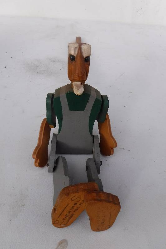 lot 7506 image: Wood puppet on a stick