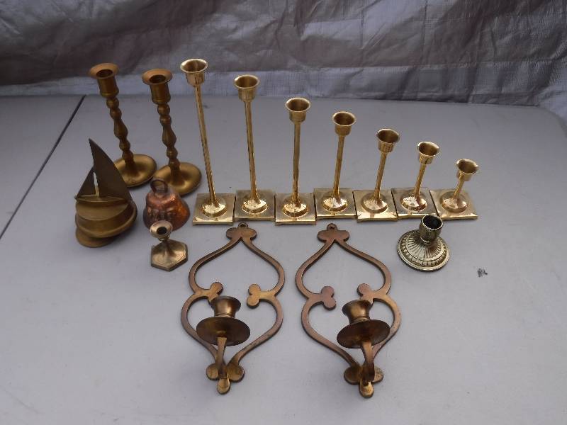 lot 7584 image: Mixed mostly brass candle holder lot