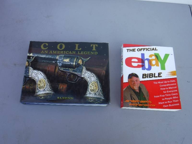 lot 6883 image: Ebay Bible and Colt firearms book