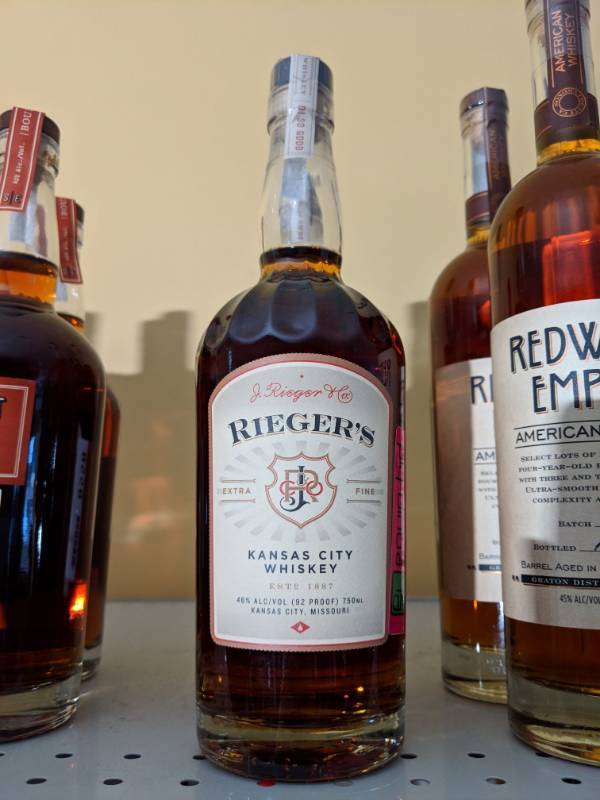 lot 8558 image: J Riegers Extra Fine Kansas City Whiskey 46 q AlcVol (92) Proof