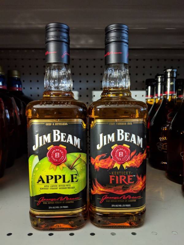 lot 8717 image: (2) Bottles 750mL Jim Beam,(1) Apple Liquor Infused With Kentucky Straight Bourbon Whisky, (1) Kentucky Fire Cinnamon Infused Liqueur Infused With Kentucky Straight Bourbon Whisky