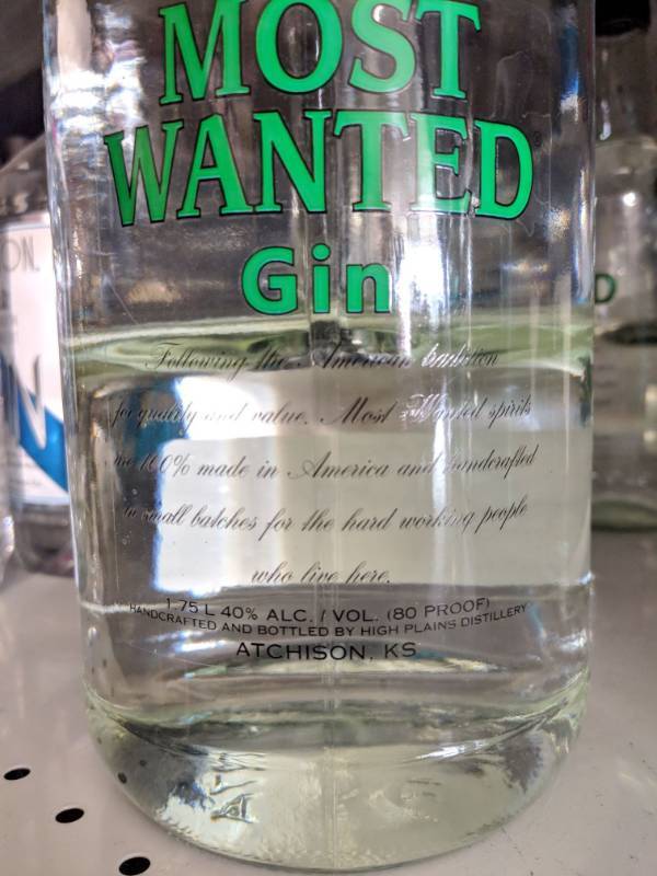 lot 8979 image: 1.75L Most Wanted Gin 40Perc Alc By Vol 80 Proofl