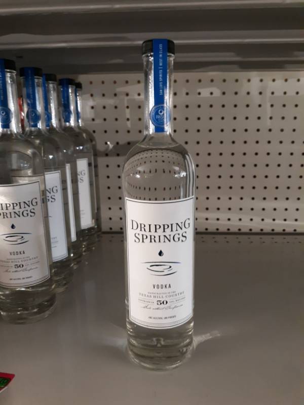 lot 9034 image: (3) Dripping Springs Vodka