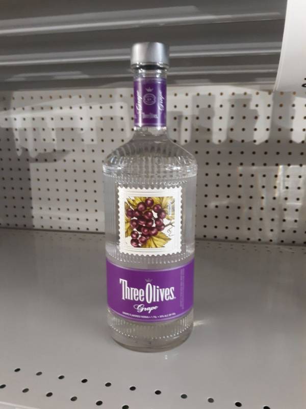 lot 9038 image: (3) Three Olives Grape