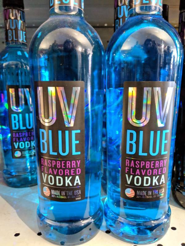 lot 9082 image: (4) 750mL UV Blue Raspberry Flavoted Vodka 30Perc Alc By Vol
