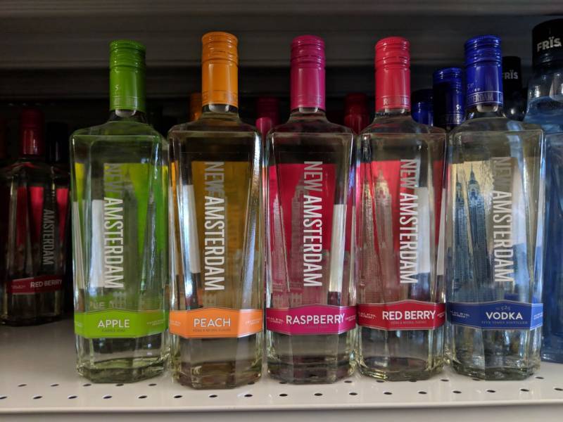 lot 9118 image: (5) 750mL Assorted Bottles Of New Amsterdam Vodka 35 Perc Alc By Vol 70 Proof