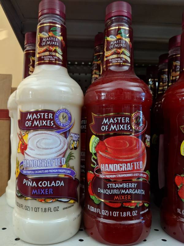 lot 9206 image: (6) 1L Master Of Mixes Handcrafted Mixers Contains 1 Perc Alc By Vol, Two Pina Colada Mixers, Four Strawberry DaiquiriMargarita Mixers