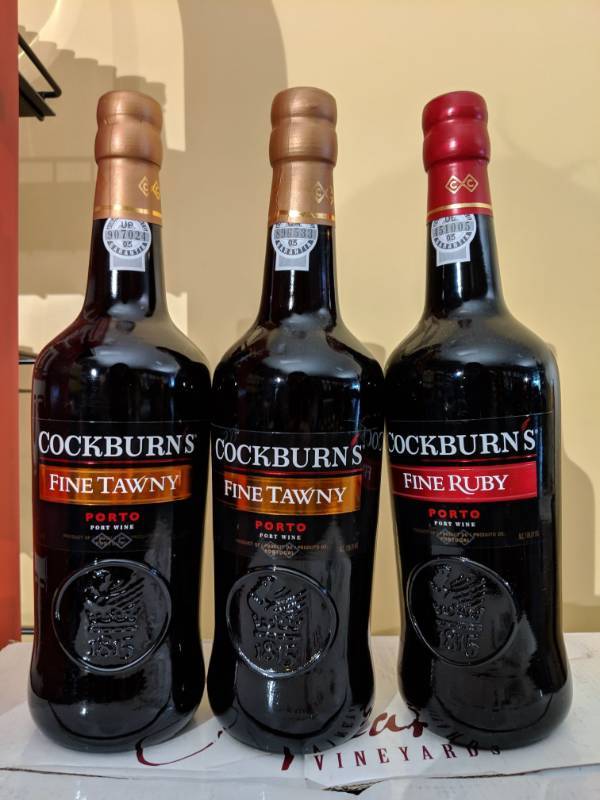 lot 9211 image: (3) Bottles Cockburns Porto Port Wine, One Fine Ruby 19 Perc Alc By Vol, Two Fine Tawny Porto Port Wine 19 Perc Alc By Vol