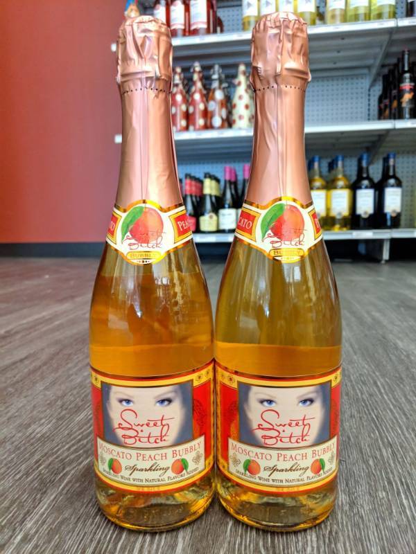 lot 9253 image: (4) 750mL Sweet Bitch Moscato Peach Bubbly Sparkling Wine 5.5 Percent Alc By Vol