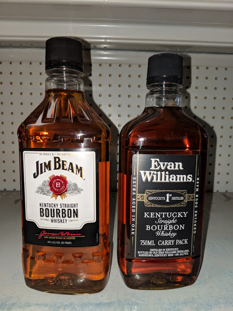 lot 8740 image: (1) Jim Beam Kentucky Straight Bourbon Whiskey, (1) Evan Williams Kentucky Straight Bourbon Whisky
