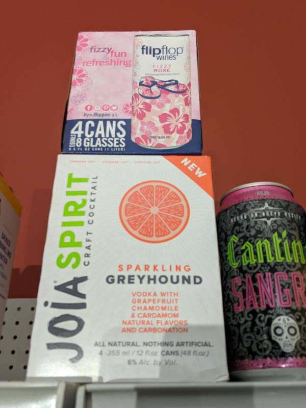 lot 9393 image: Grab Bag 8 375mL Cans Of Cantina Sangria 10 Perc Alc By Vol, 1 Four Pack Of 8.5Fl Oz Cans Of Flip Flop Wines Fizzy Rose Wine 6.5Per Alc By Vol, One Four Pack Of 12Fl Of Cans Of Joia Spirit Craft Greyhound Sparkling Cocktail 6 Perc Alc By Vol