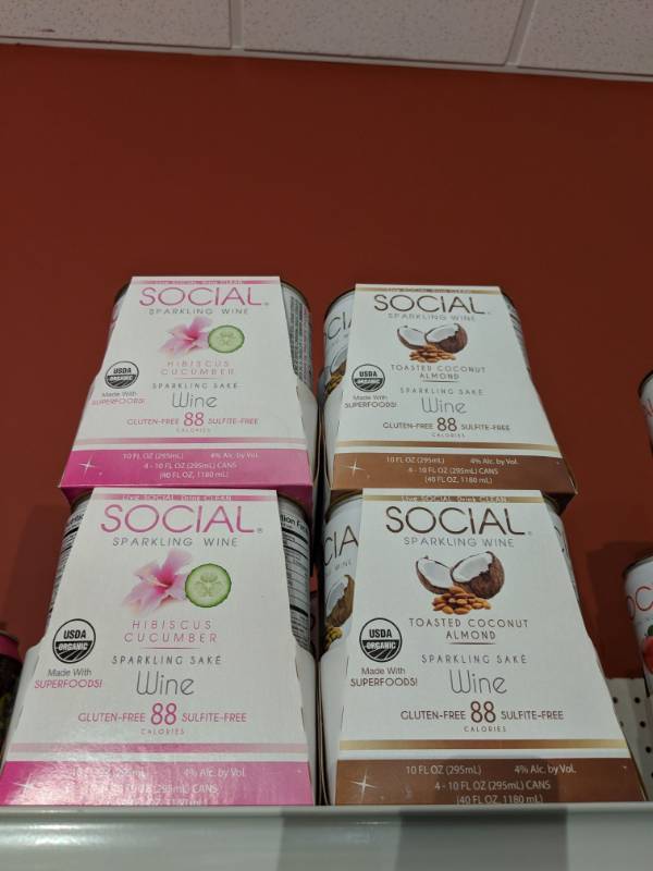 lot 9394 image: 5 Cases Of Social Sparkling Wine Gliten Free 10fl Oz Cans 4 Perc Alc By Vol, Two Cases Of Hibiscus Cucumber and One Case Of Toasted Coconut Almond