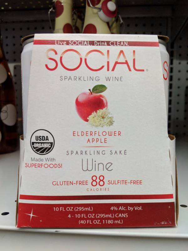 lot 9395 image: (5) Cases Of Four 10Fl Oz Cans Of Gluten Free Elderflower Apple Sparkling Sake Wine 4 Perc Alc By Vol