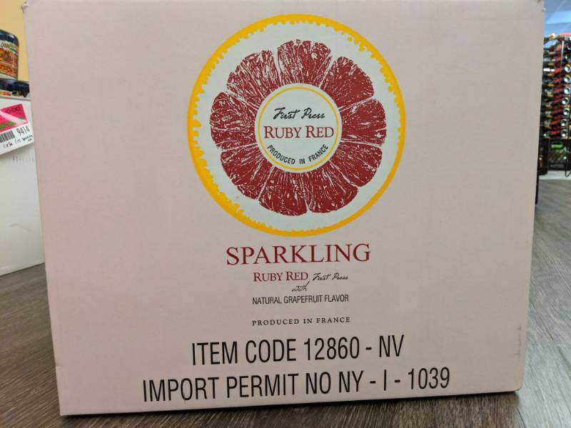 lot 9412 image: (1) Box Of 12 750mL Sparkling Ruby Red First Press With Natural Grapefruit Flavor 8.5 Perc Alc By Vol