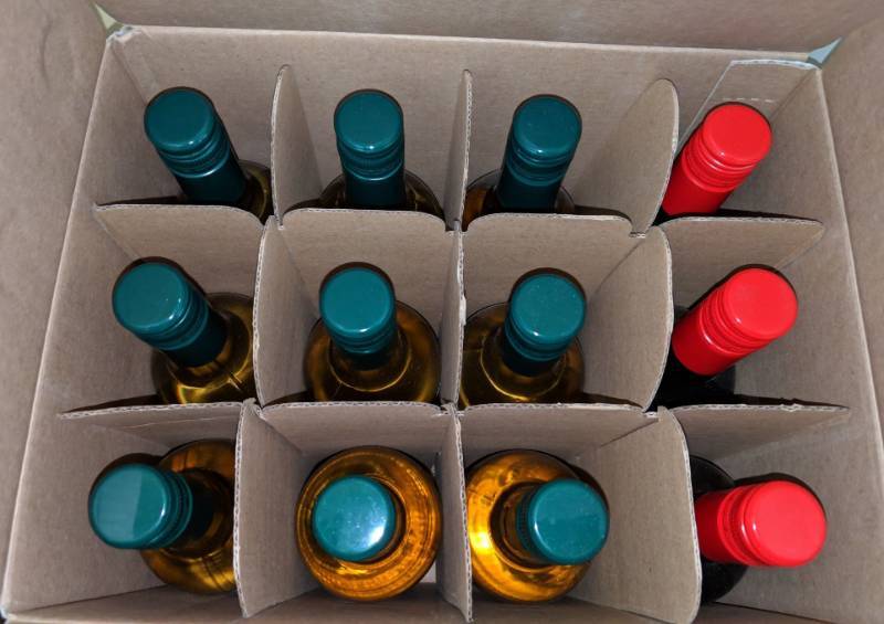 lot 9413 image: (1) Box Of Ugly Sweater 12 70mL Bottles, (9) White Blend Table Wine 13 Perc Alc By Vol, (3) Red Blend Table Wine 13.5 Perc Alc By Vol