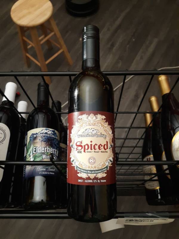 lot 9424 image: (4) Wyldewood Cellars Spiced Wine