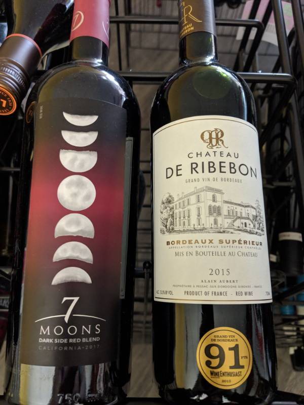 lot 9721 image: (3) 750mL Red Wine (1) Chateau De Ribebon Bordeaux Superior 13.5Perc Alc By Vol, (2) 7 Moons Darkside Red Blend 13.5Perc Alc By Vol
