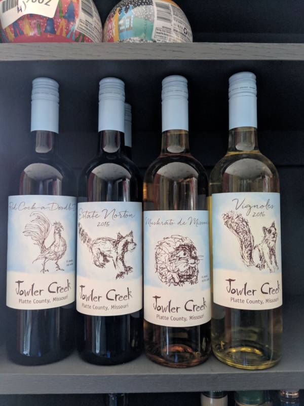 lot 9806 image: (5) 750mL Jowler Creek Wines (1) Viagnoles White Wine 11 Perc Alc By Vol, (1) Muskerato De Missouri Sweet White Wine 10Perc Alc By Vol, (1) Red Cock-A-Doodle-Do Red Wine 10Perc Alc By Vol, (2) Estate Norton Red Wine 12 Perc Alc By Vol