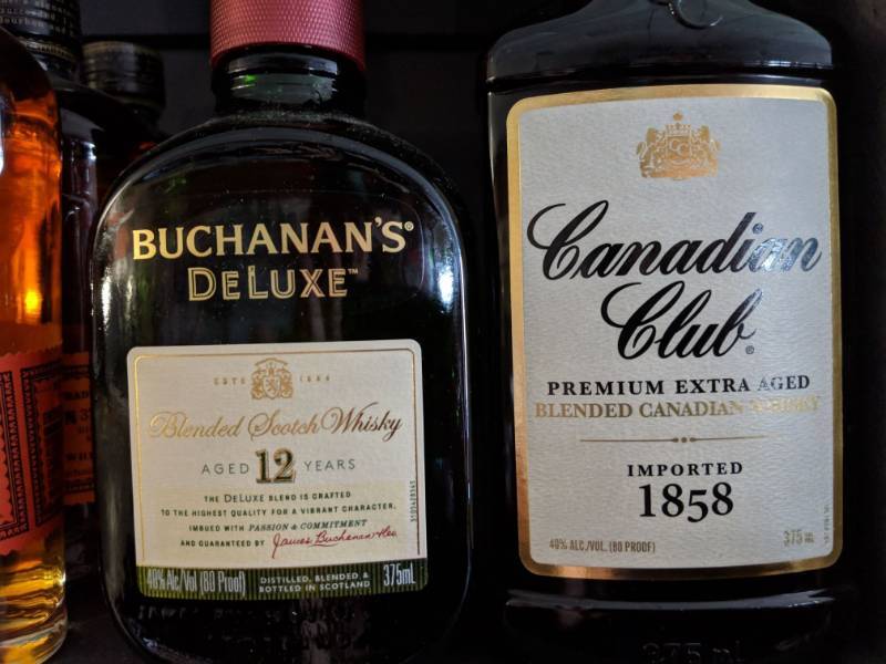 lot 9860 image: (2) 375mL Blended Whisky  (1) Buchanans Deluxe Blended Scotch Whisky 40Perc Alc By Vol,(1) Canadian Club Blended Canadian Whisky 40 Percent Alc By Vol