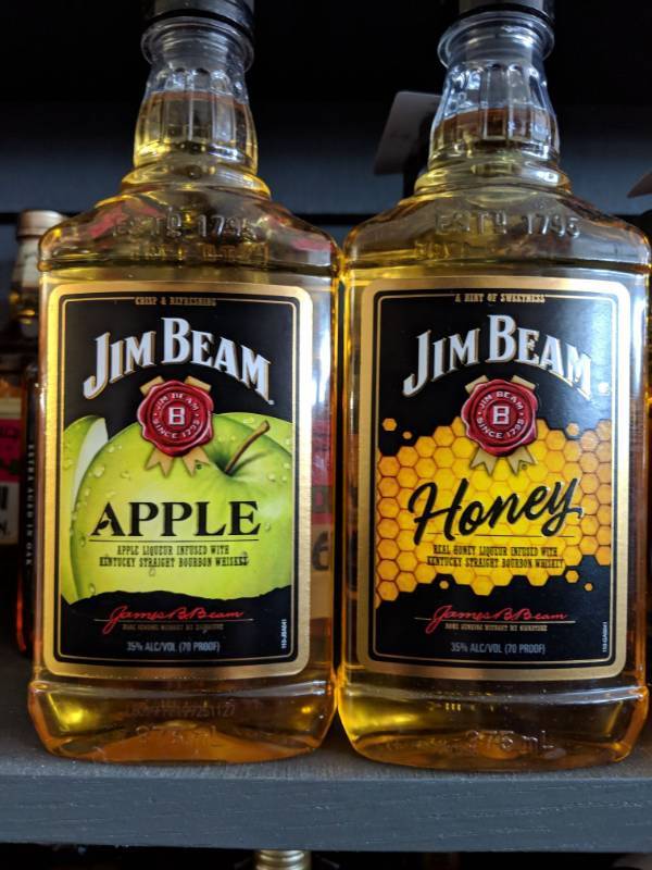 lot 9870 image: (2) 375mL Jim Beam Flavored Whiskey (1) Honey 35Per Alc By Vol, (1) Apple 35Perc Alc By Vol