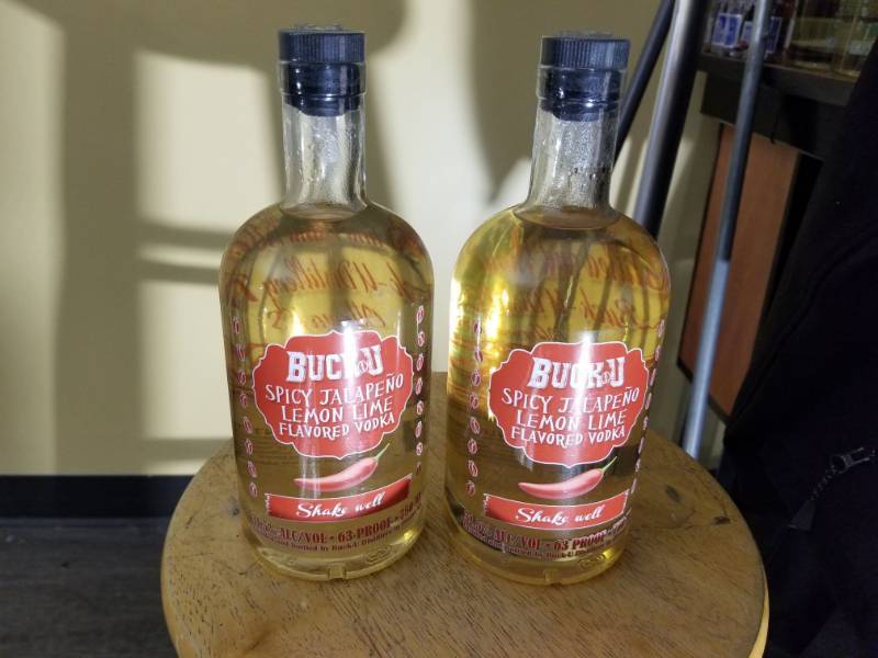 lot 9799 image: (2) Buck U Spicy Jalapeno 750mL