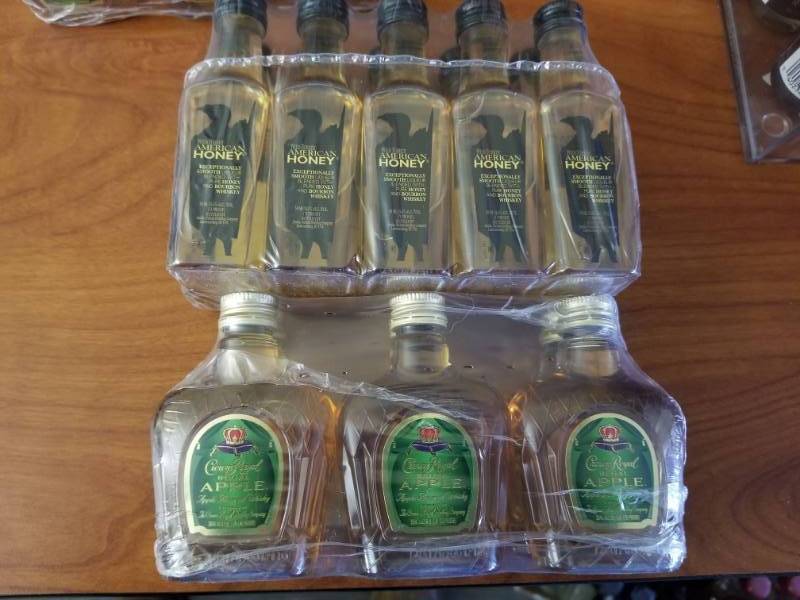 lot 15006 image: (1) Pack Mini American Honey, (1) Pack Mini Apple Crown Royal
