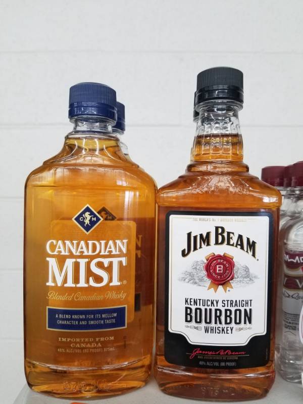 lot 15012 image: (2) Canadian Mist 375mL, (2) Jim Beam 375mL