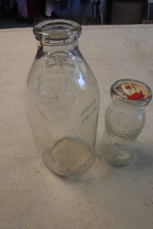 lot 12251 image: Glass milk bottles