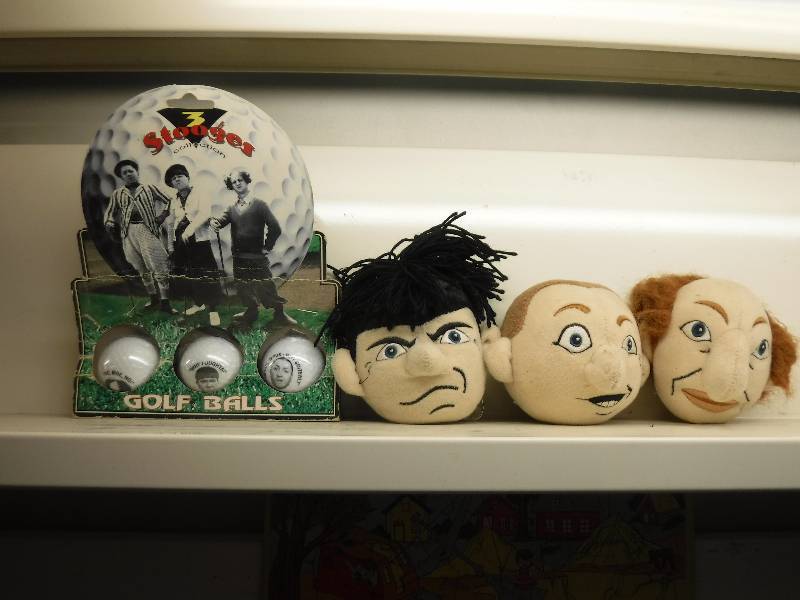 lot 10075 image: 3 stooges Golf balls set and heads