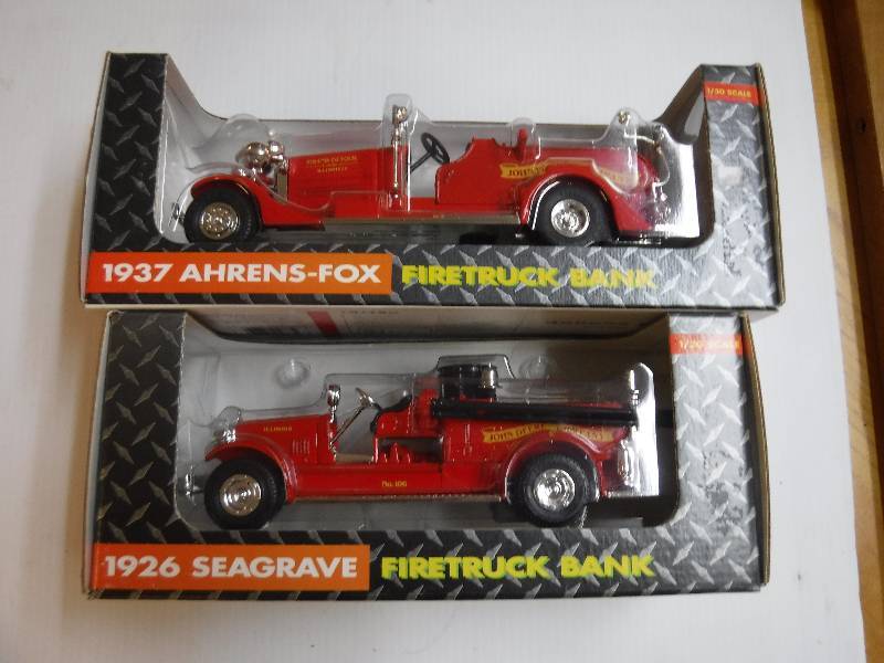 lot 10087 image: 1937 Ahrends Fox and 1926 Seagraves Fire truck banks