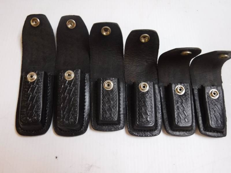 lot 10111 image: Pocket knife holster lot