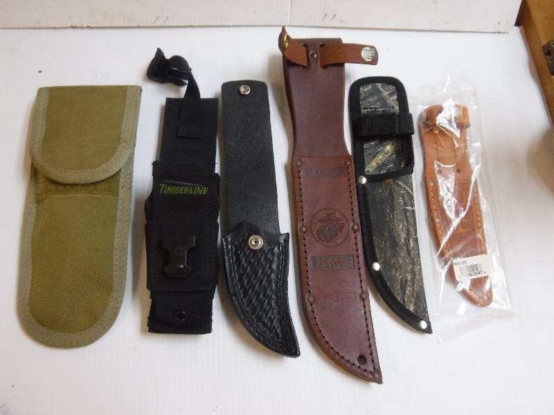 lot 10112 image: Various styles of knife holsters