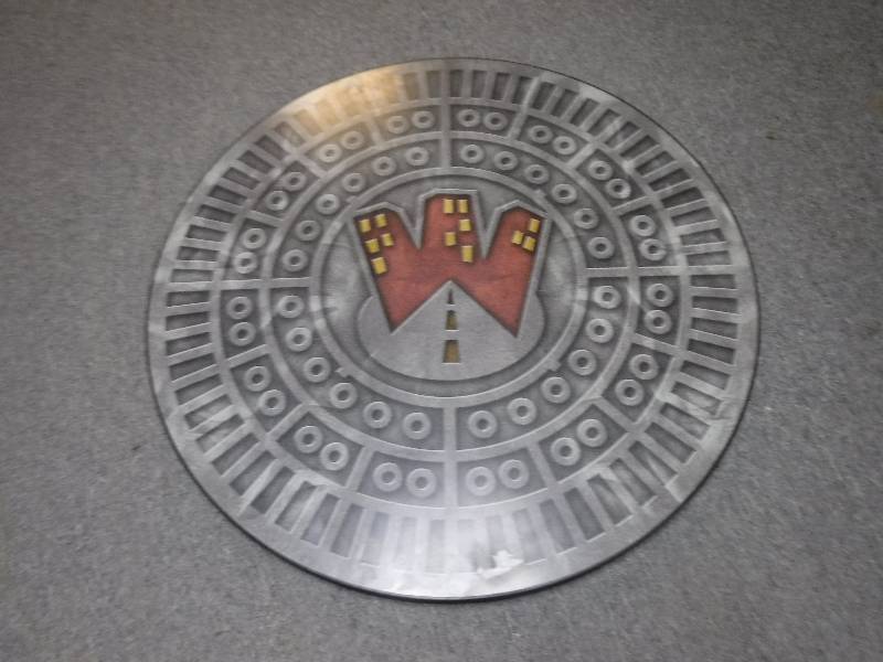 lot 10127 image: Man Hole cover look table top