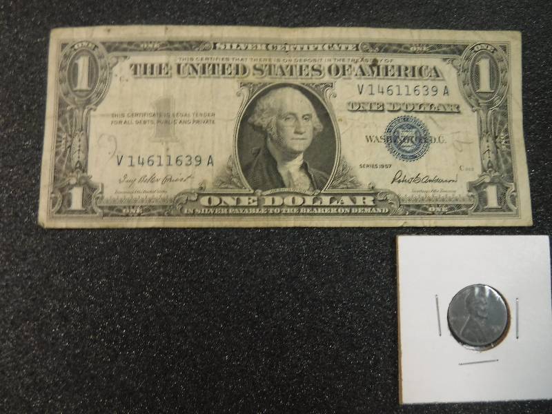 lot 9854 image: One Dollar Blue Seal Silver Certificate Series 1957 and a Steel Penny