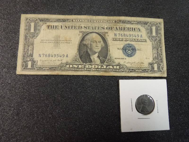 lot 9855 image: One Dollar Blue Seal Silver Certificate Series 1957A and a Steel Penny