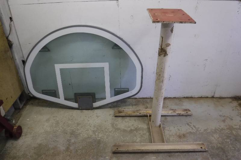lot 8351 image: Glass basketball backboard with mount came out of a high school