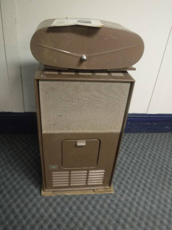 lot 12290 image: Vintage Sears Oil Burning Circulating Heater