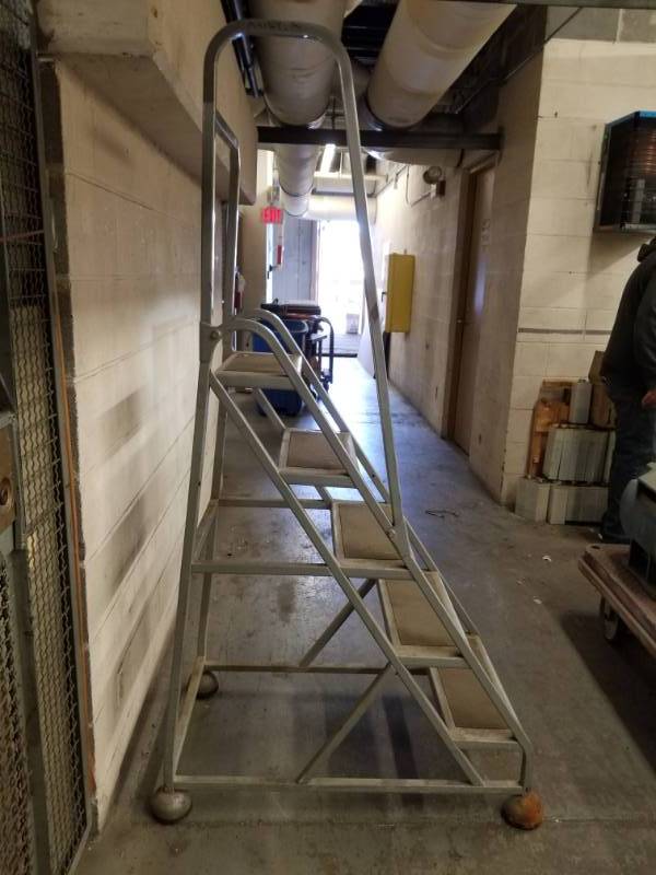 lot 8033 image: Rolling Metal Stairs