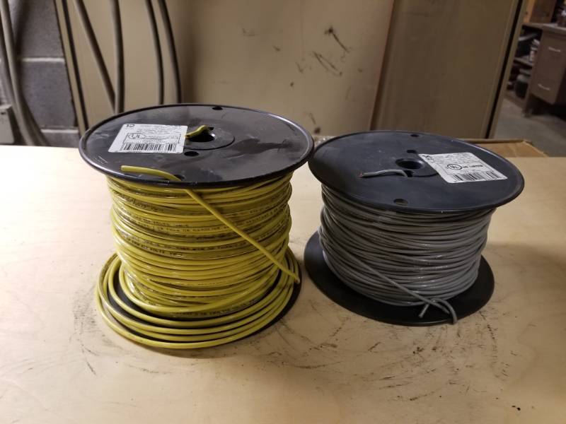 lot 8099 image: 12 Yellow Stranded Copper & 14 Gray Stranded Copper Wire Spools