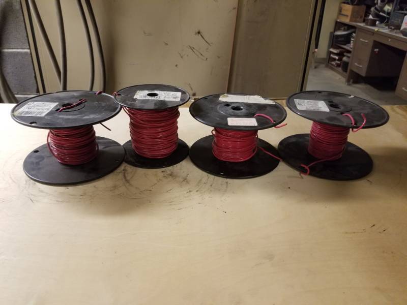 lot 8101 image: 18 Red Fixture Wire Part Spools